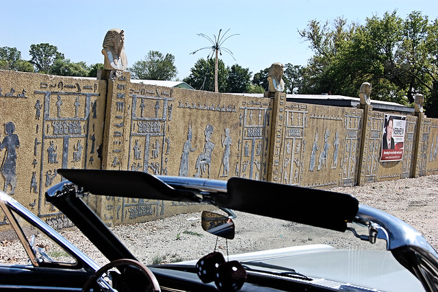 Large sign for a local political candidate is posted on the hieroglyphic wall to the property