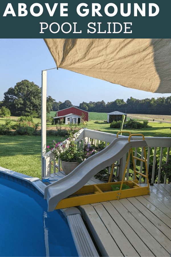 Pool slide installed on desk of above ground pool