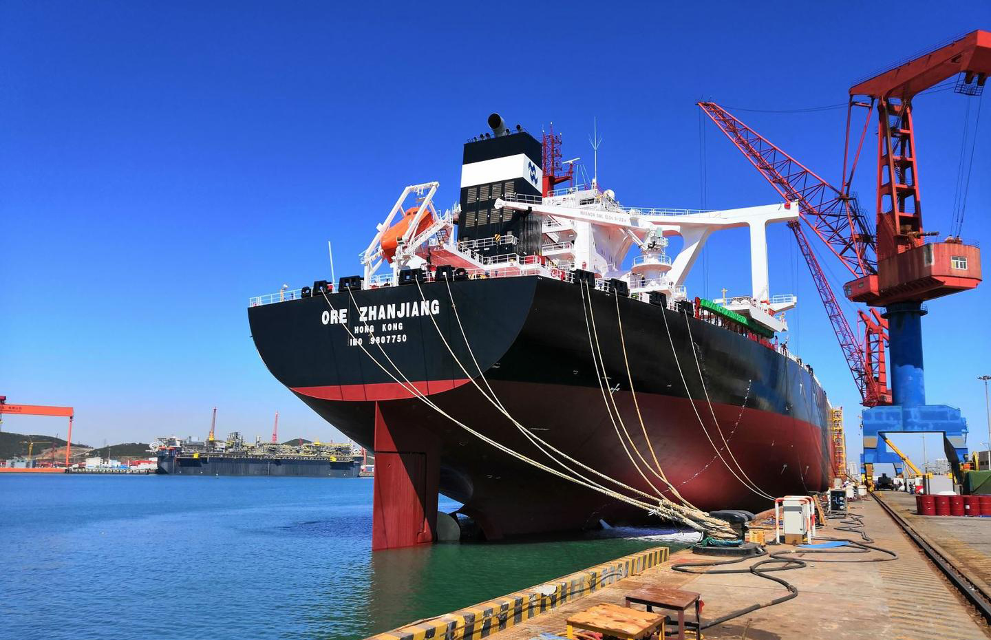 Very Large Ore Carrier - ORE ZHANJIANG vessel is mooring at berth with FBR hmpe mooring ropes.