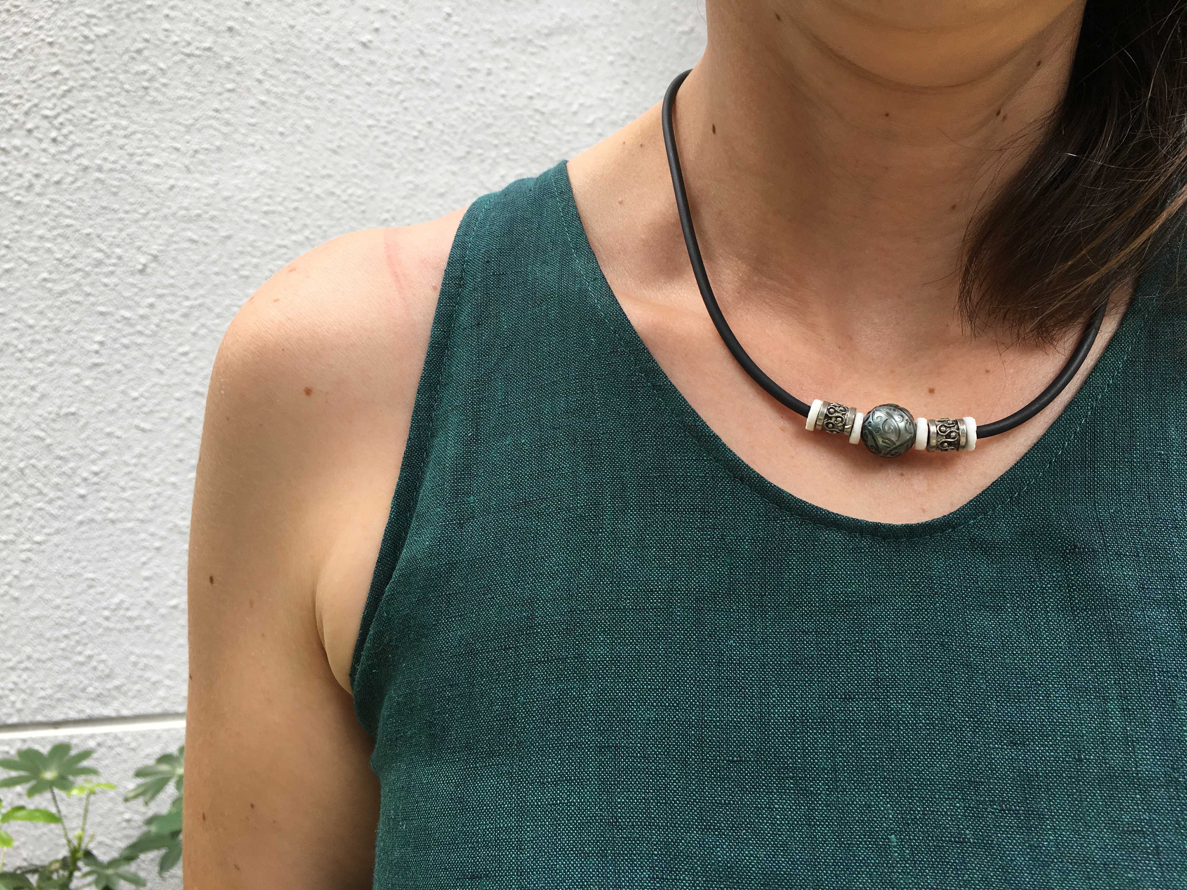 Neckline detail with a tiny turned edge.