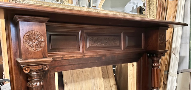 Carving detail of substantial polished timber mantelpiece, decorated with flowers and botanical designs, fluted pillared legs, hand made in Adelaide by Woodchucks approx. 30 years ago, reproduction Colantis mantel, top shelf W 1780 x D 315mm, height 1305mm, outer leg 1490mm, opening 910 x 910mm (M290) $2450 salvaged vintage recycled, demolition, reproduction, restoration, home renovation secondhand, used , original, old, reclaimed, heritage, antique, victorian, art nouveau edwardian georgian art deco