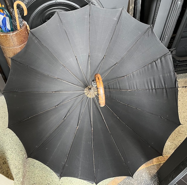salvaged vintage recycled, demolition, reproduction, restoration, home renovation secondhand, used , original, old, reclaimed, heritage, antique, victorian, art nouveau edwardian georgian art deco Interior of circa1900 antique gentleman's black cotton umbrella, cane handle with silver handle tip, 16 ribs, 110cm diam, marked J.W and GWBS, likely for George William Betjemann & Sons, silversmiths, UK. some moth holes, small tears to several tips, otherwise works well. (RR279) $70