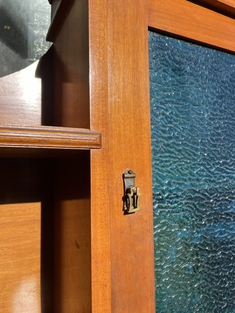Detail of Arts and Crafts original polished timber mantelpiece, double shelf with blue glass cabinet door, width 1453mm, height 1945mm, outer leg 1380mm, opening 915 x 915mm (M326) $745 salvaged vintage recycled, demolition, reproduction, restoration, home renovation secondhand, used , original, old, reclaimed, heritage, antique, victorian, art nouveau edwardian georgian art deco