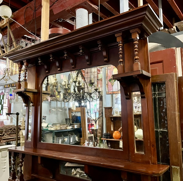 Overmantel detail of Edwardian polished original timber mantel with matching overmantel mirror, canopy 1560 x 215mm, shelf 1600 x 350mm, height overall 2365mm, outer leg 1445mm, opening W 1050 x H 935mm (M340) $1200 salvaged vintage recycled, demolition, reproduction, restoration, home renovation secondhand, used , original, old, reclaimed, heritage, antique, victorian, art nouveau edwardian georgian art deco