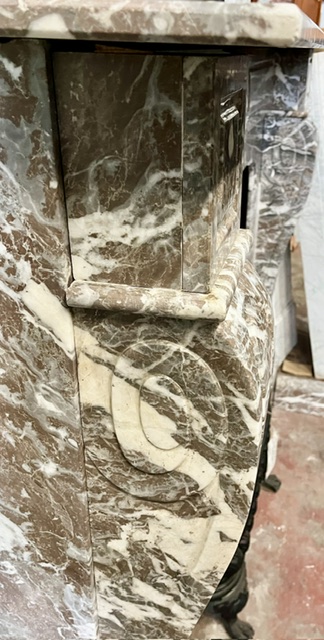 Left leg detail of French style marble mantel with ornate carved legs and breast plate in red, grey and white marbling, top shelf 1550 x 400mm, height 1190mm, outer leg 1380mm, opening H 920 x W 900mm with matching marble fire curb W 1380 x H 100 x D 335mm (M344) $7,500 salvaged vintage recycled, demolition, reproduction, restoration, home renovation secondhand, used , original, old, reclaimed, heritage, antique, victorian, art nouveau edwardian georgian art deco