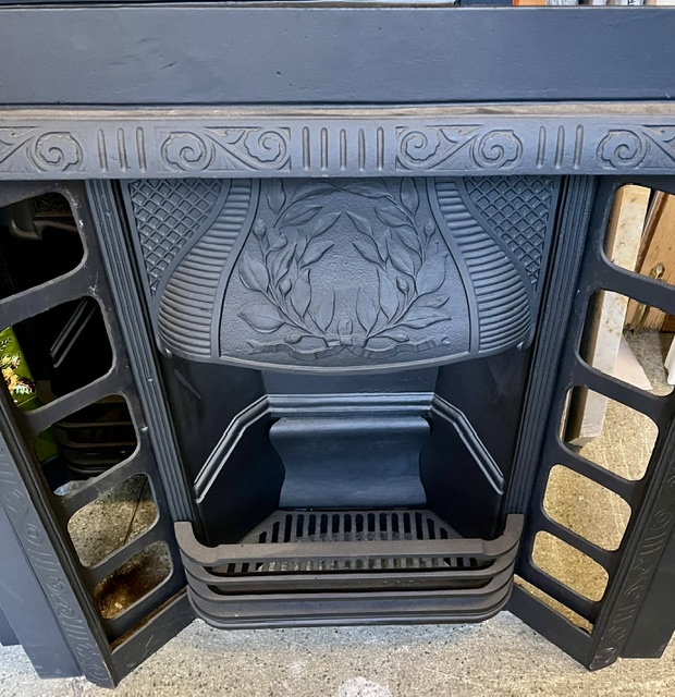 Detail of Austral cast iron fire insert, circa 1915, wreath hood, original and fully restored by Feds, 965 x 965mm, 4 available (F481) $765 plus price of tiles of your choice salvaged vintage recycled, demolition, reproduction, restoration, home renovation secondhand, used , original, old, reclaimed, heritage, antique, victorian, art nouveau edwardian georgian art deco