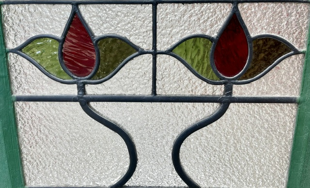 Detail of Art Nouveau original hopper window with stylised red and green flowers, frame W 1013 x H 640mm, glass W 895 x H 492mm (LL390) $425 salvaged, recycled, demolition, reproduction, restoration, home renovation secondhand, used , original, old, reclaimed, heritage, antique, victorian, art nouveau edwardian, georgian, art deco washstand fireplace hearth tiles