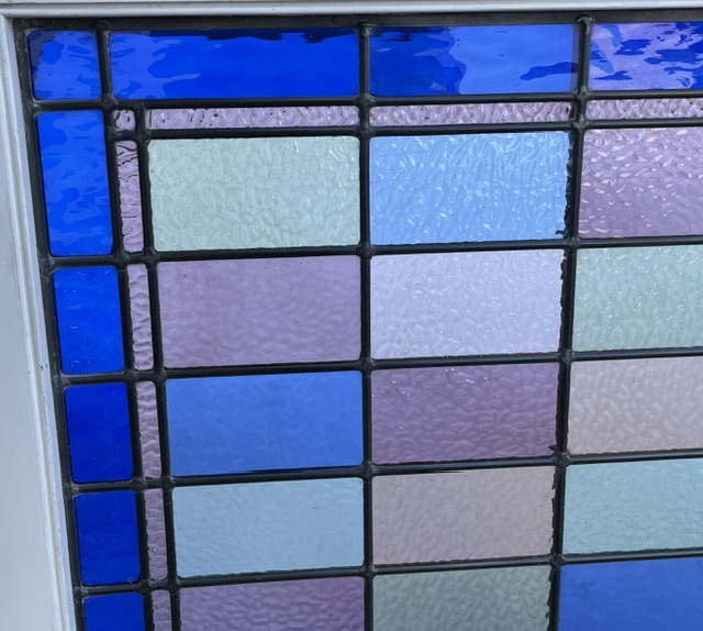 Detail of cool coloured leadlight checkerboard timber frame window, pinks, blue, purple, green, yellow with turquoise blue border, frame 860 x 1185mm, glass 620 x 1005mm (LL393) $585 salvaged vintage recycled, demolition, reproduction, restoration, home renovation secondhand, used , original, old, reclaimed, heritage, antique, victorian, art nouveau edwardian georgian art deco