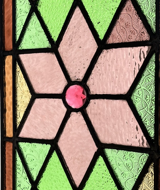 Detail of pair of original restored geometric leadlight panels, central pink star design with pink, cerise, yellow and green textured diamond panes, each panel is 1090 x 310mm (LL401 FT) $875 PAIR salvaged, vintage recycled, demolition, reproduction, restoration, home renovation secondhand, used , original, old, reclaimed, heritage, antique, victorian, art nouveau edwardian, georgian, art deco