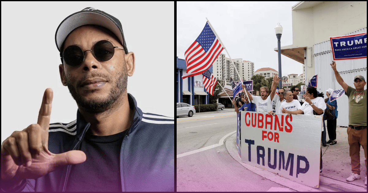 Cuban rapper El Funky, wearing sunglasses and a baseball cap, holds up his hand in a gesture. In the background, Cuban Americans hold American flags and a large sign that says “Cubans for Trump” as they rally in support of Trump’s policies.