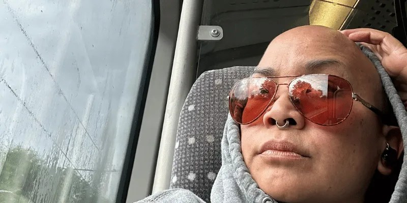 Me sitting on a train during a long journey