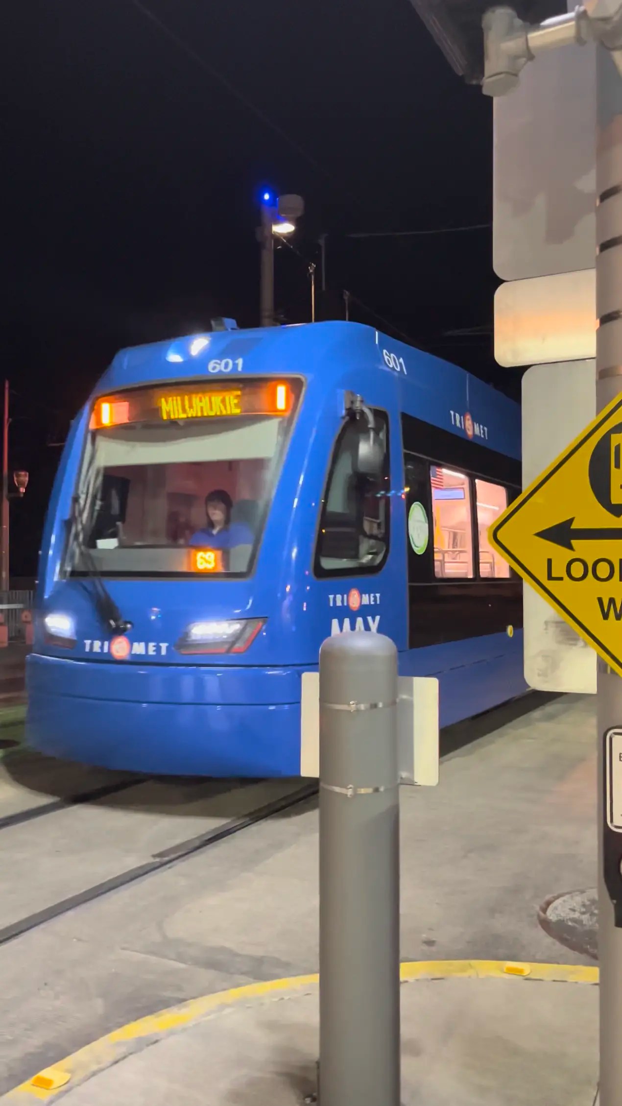 Still frame from a video of TriMet MAX 601 arriving at S Waterfront/S Moody as a single car service.
