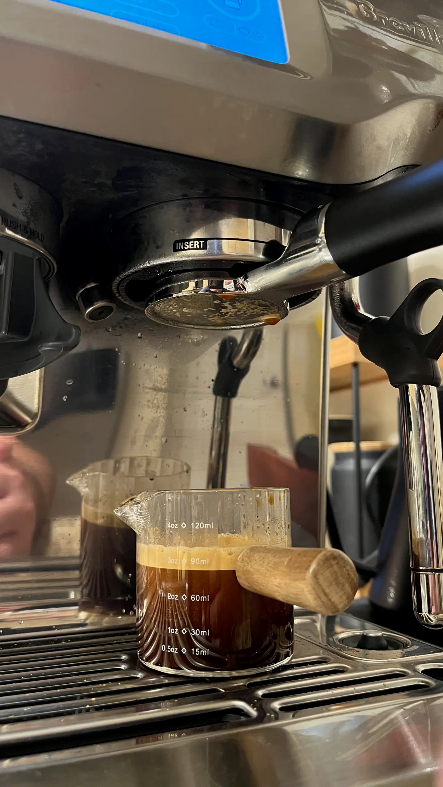Photo of a just pulled double shot of espresso using a unibody bottomless portafilter from Normcore.