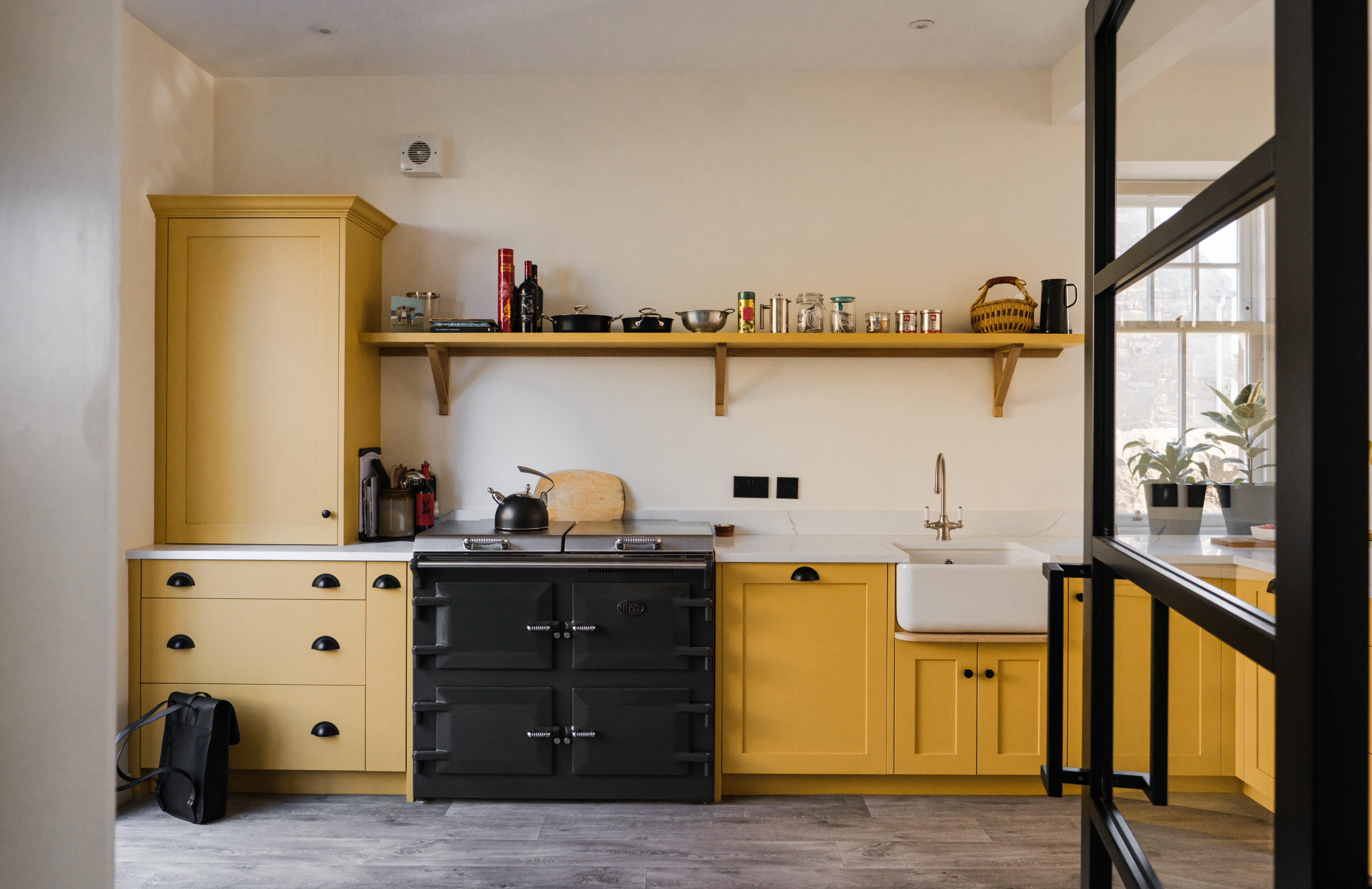 open Plan yellow kitchen