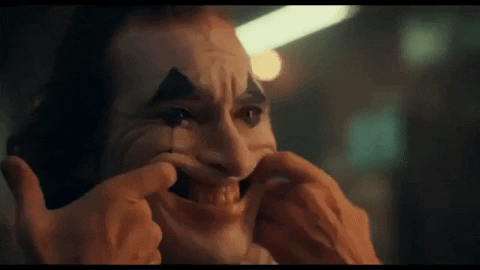 Sympathy For Mr. Fleck: A Filthy Dreams Dueling Review Of “Joker 