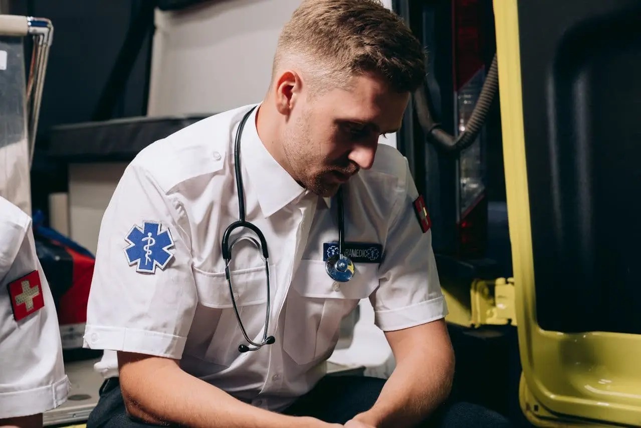 a-paramedic-with-a-stethoscope-draped-around-his-neck