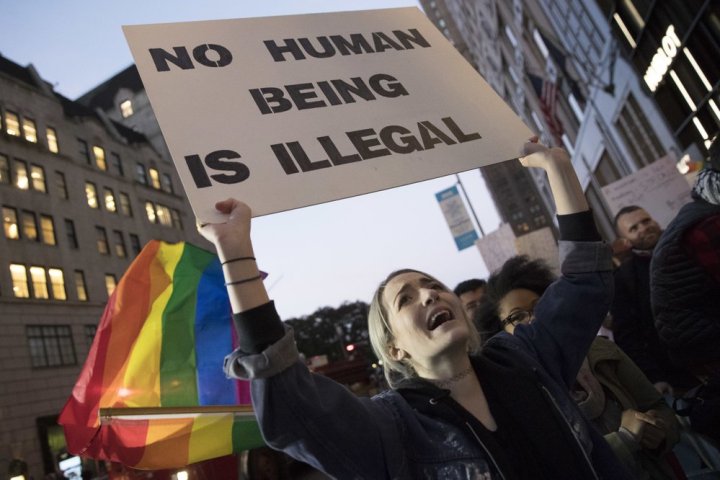 Woman holding sign in protest