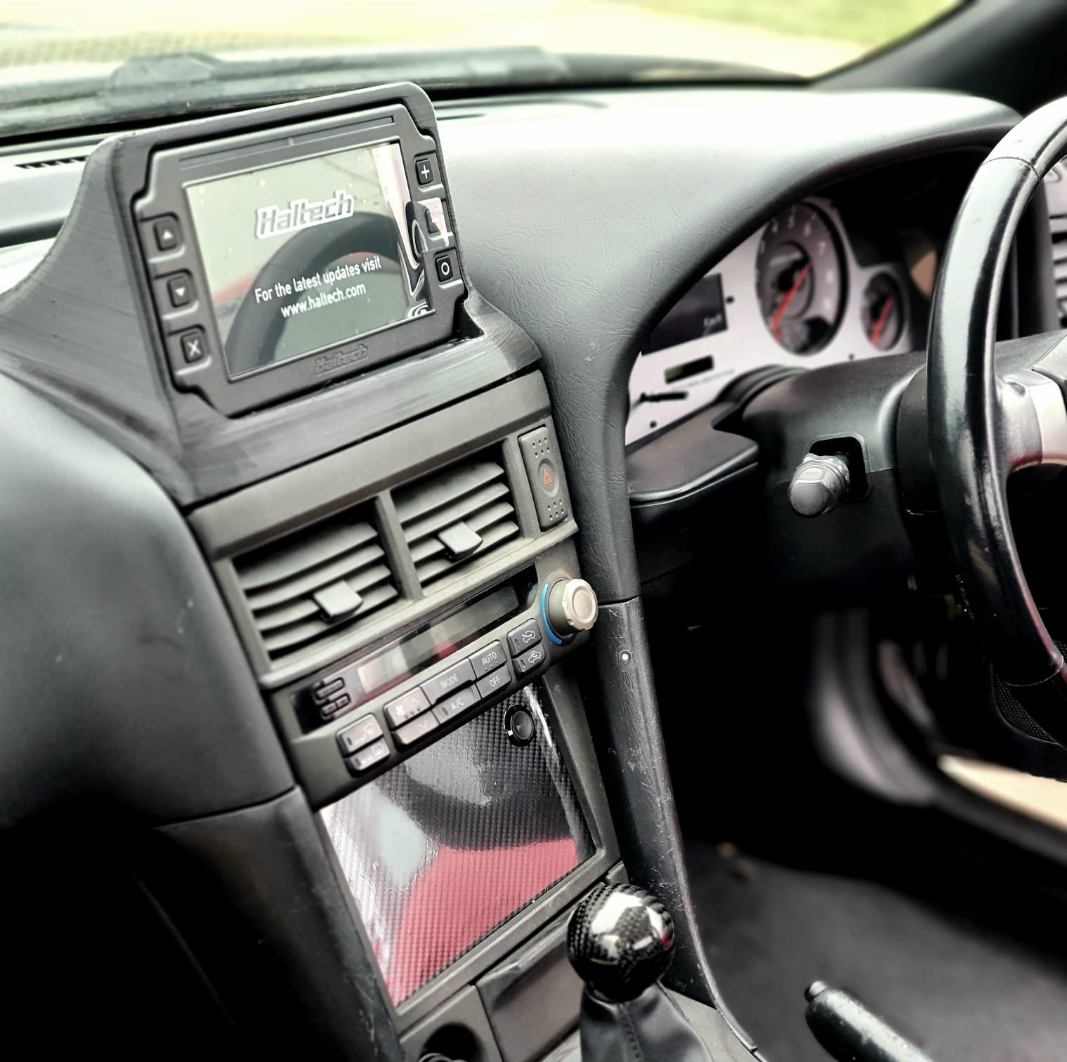 Nissan Skyline R34 GT-R MFD cover | Fischer Racing