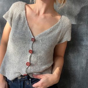 Product image for Cardi Tee knitting pattern — Cropped button-front t-shirt cardigan in garter stitch, featuring a V-neck and subtle feminine silhouette.