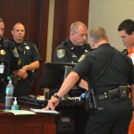 Bailiffs at the center of an inquiry the sheriff has ordered reopened, seen here during court proceedings last year, include Sgt. John Bray, left, Jeffrey Puritis and John Freshcorn. Bray was the bailiffs' supervisor. (c FlaglerLive)