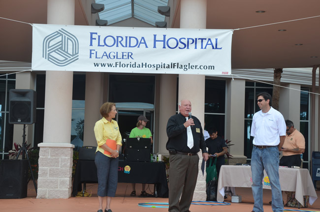 Never a limelight seeker, David Ottati, right, was widely respected and celebrated locally, as was the case at last September's 10-year anniversary of Florida Hospital at its current location, with Palm Coast Mayor Jon Netts and County Commissioner Barbara Revels, who is also a member of the hospital's board. (© FlaglerLive)
