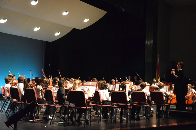One of the Flagler Youth Orchestra's ensembles performing at last December's concert at the Flagler Auditorium, under the direction of Maggie Snively. (© FlaglerLive)
