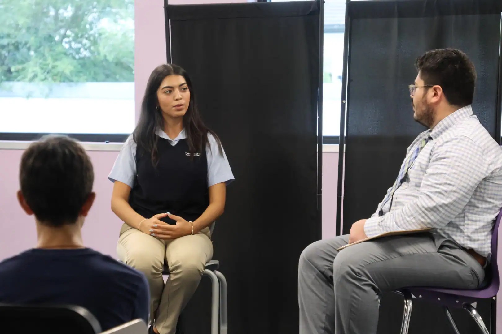 Student interview session at Florida Institute of Classical Learning promoting education and classical studies in Florida.