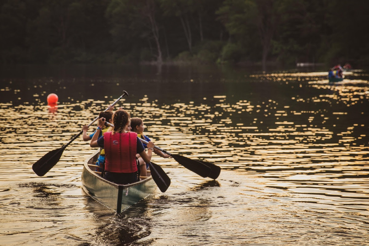 family in a canoe