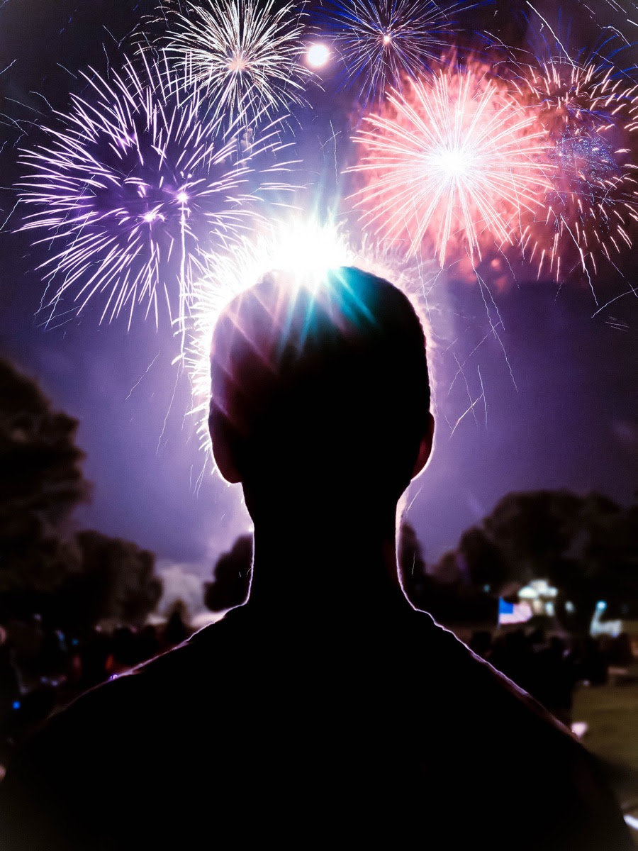 person watching fireworks