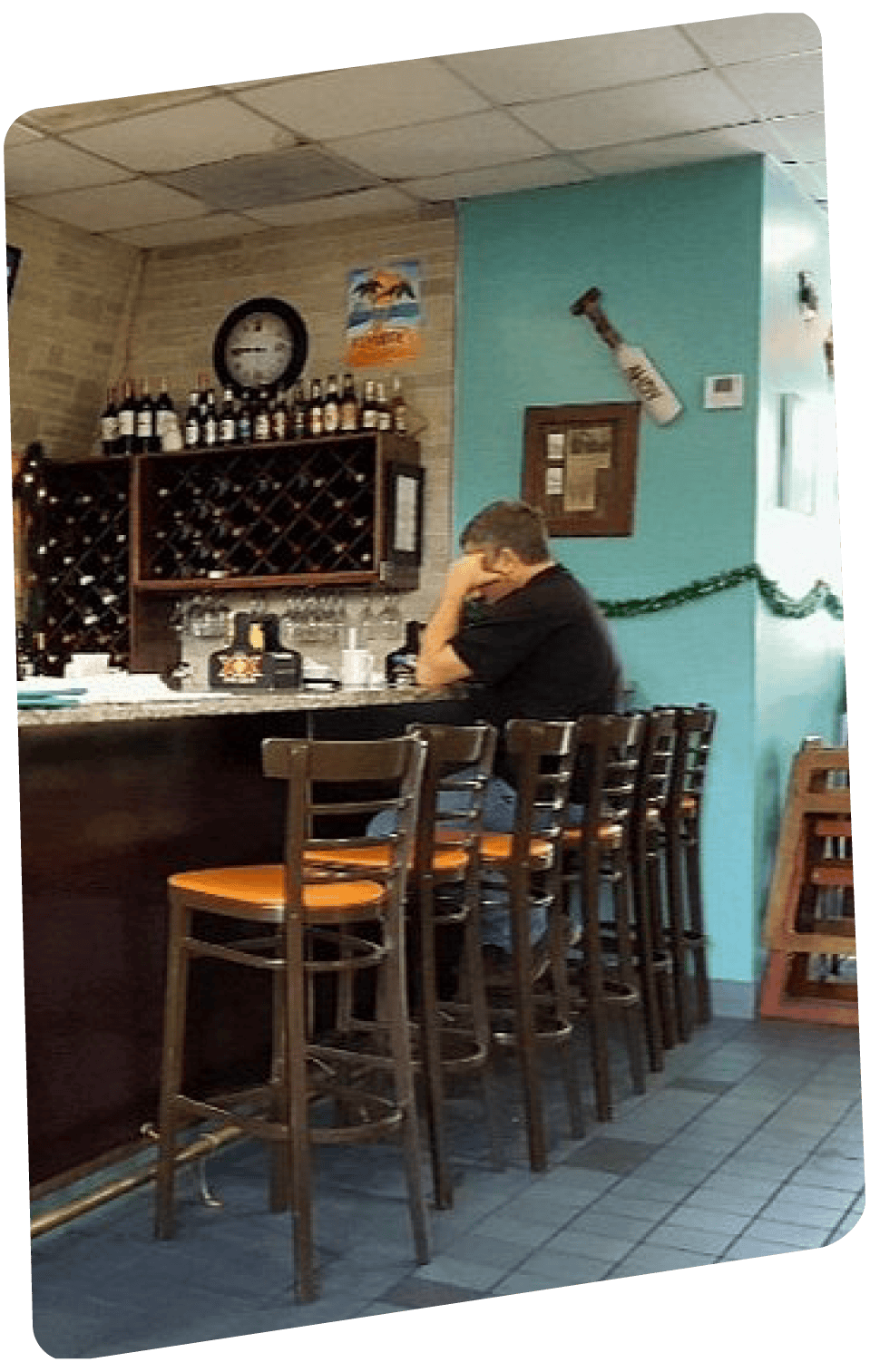 Indoor bar seating with wooden stools at KeysBite