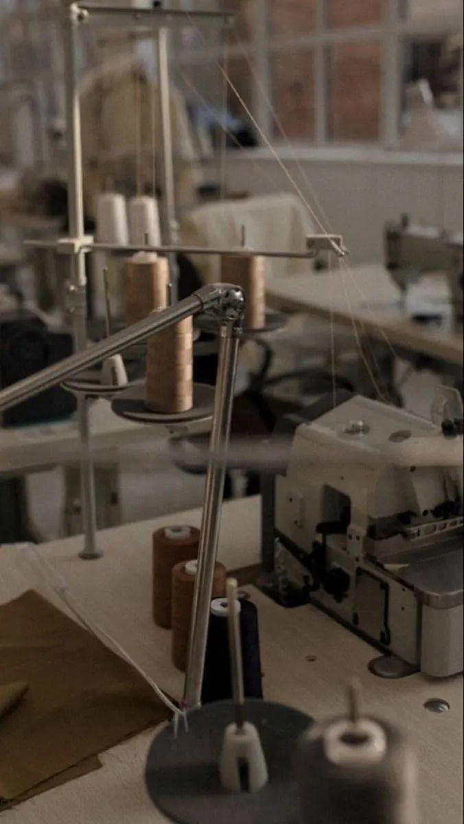 Sewing machine with spools of thread