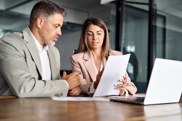 Lawyer providing tailored support to a mature client preparing a DIY Partner Visa application