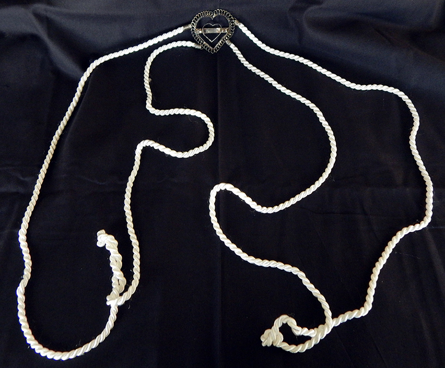 Ties bride and groom together-Philippines-Roman/Catholic/Latino-White cord with metal hearts-50" long-hearts 2"x2"