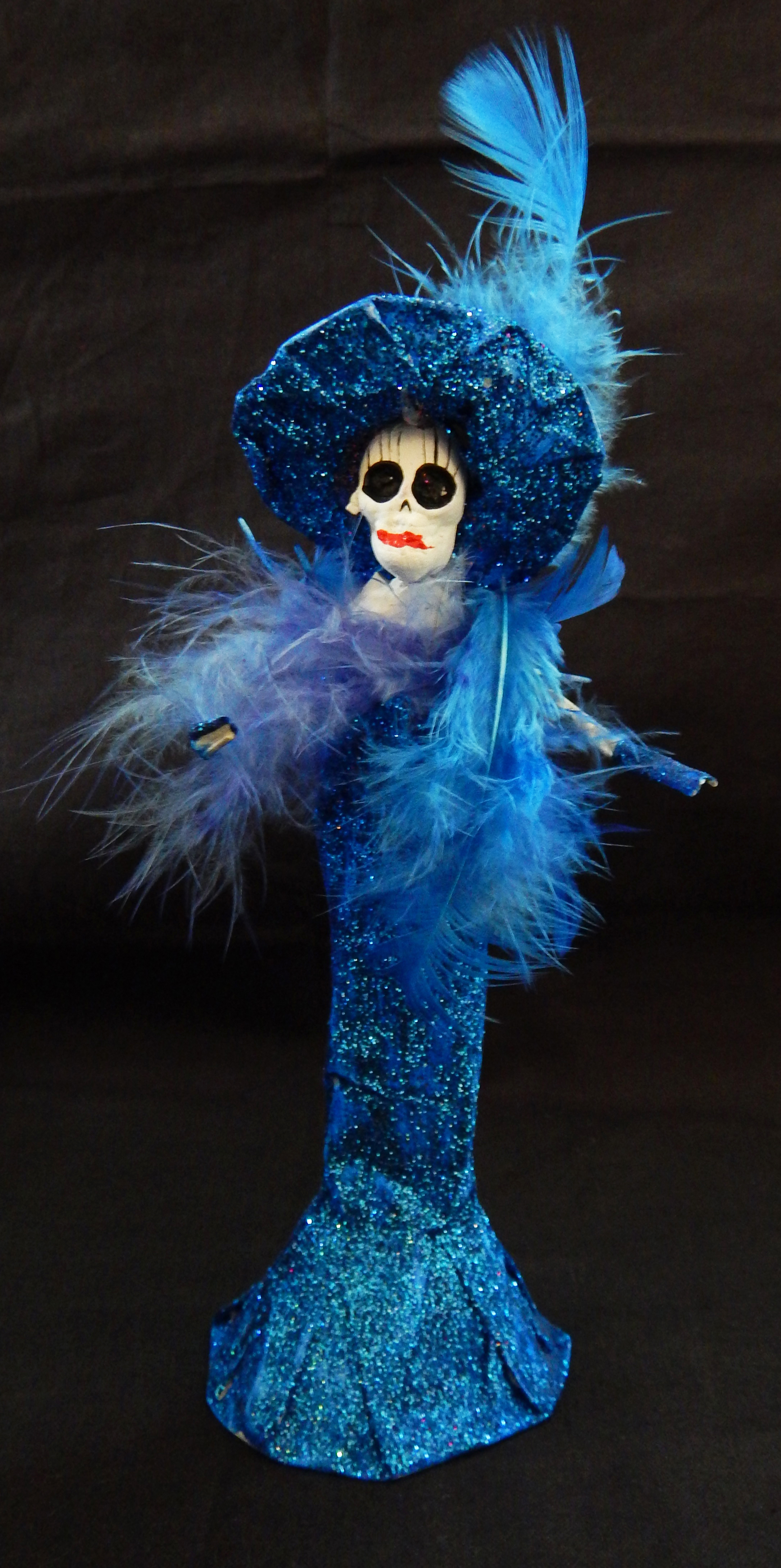 Catrina figurine (concept originally created by Mexican artist José Guadalupe Posada)