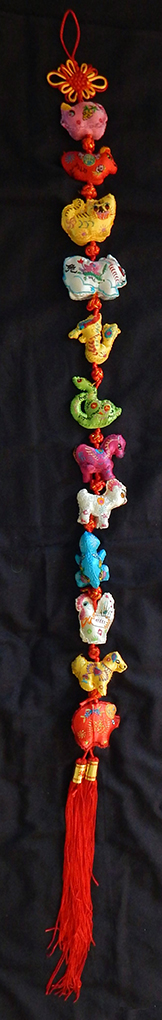 Calendar-each animal represents specific characteristics of person born in its year.-China/Any other country where Buddhists reside-Buddhist-Embroidered cloth/Stuffing-51"