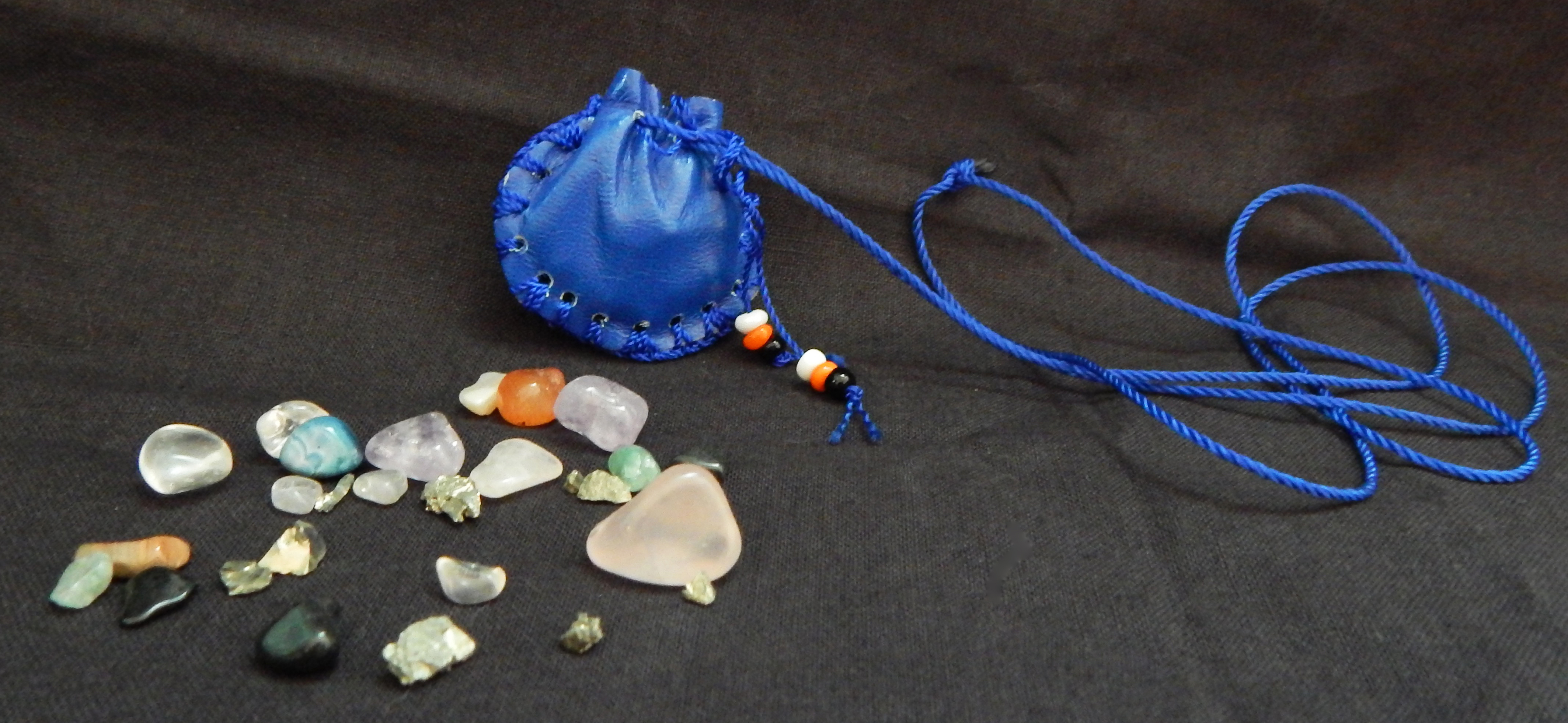 Good luck/Protection-USA-Native American-Leather with variety of gemstones inside pouch-15 1/2" long, pouch 1 1/2"