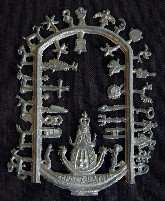 Protection-Copacabana, Peru-Catholicism/Indigenous-Tin with multi-symbol cut-outs-3 1/4" x 2 1/4"