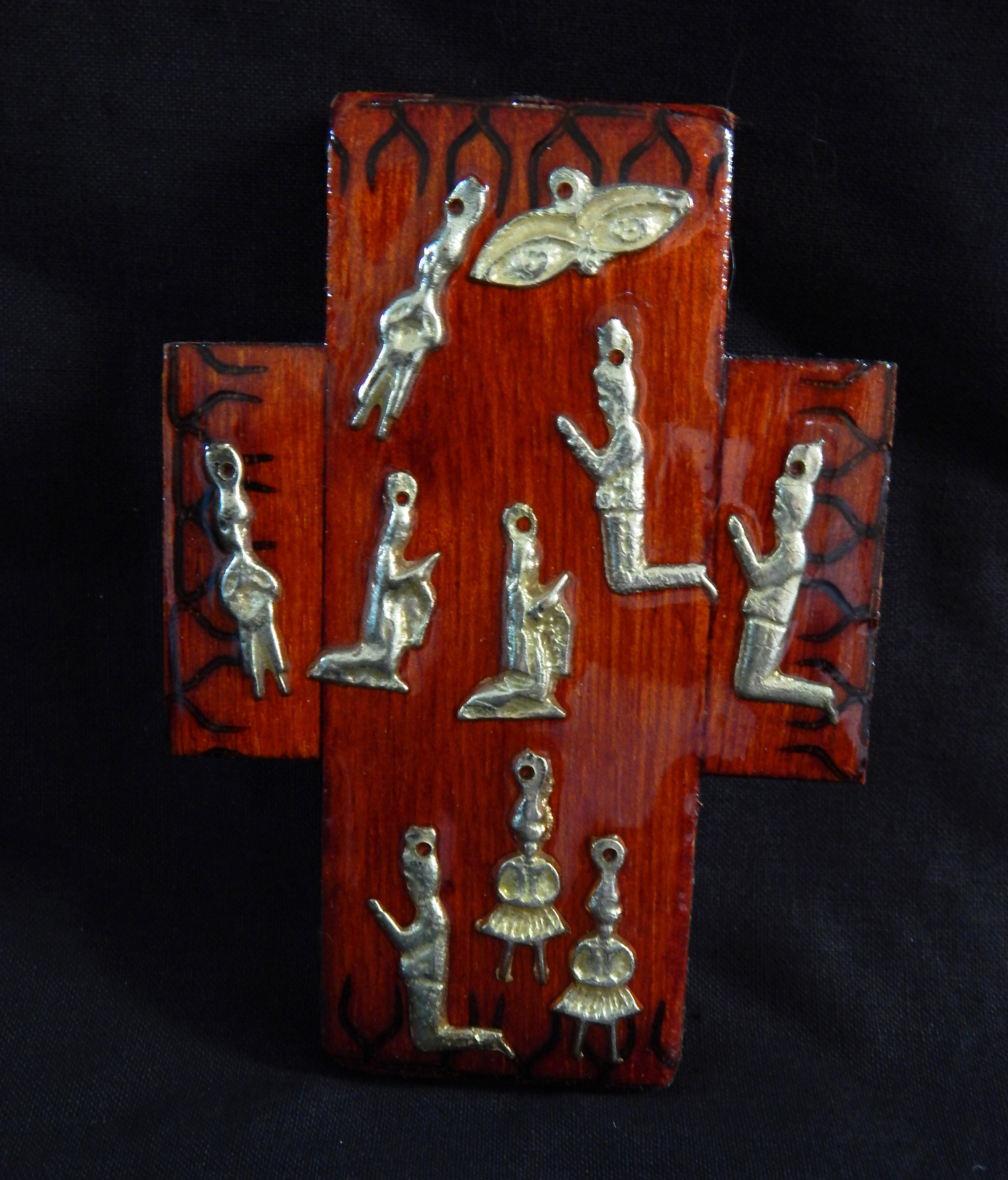 Cross with milagros (miracles)