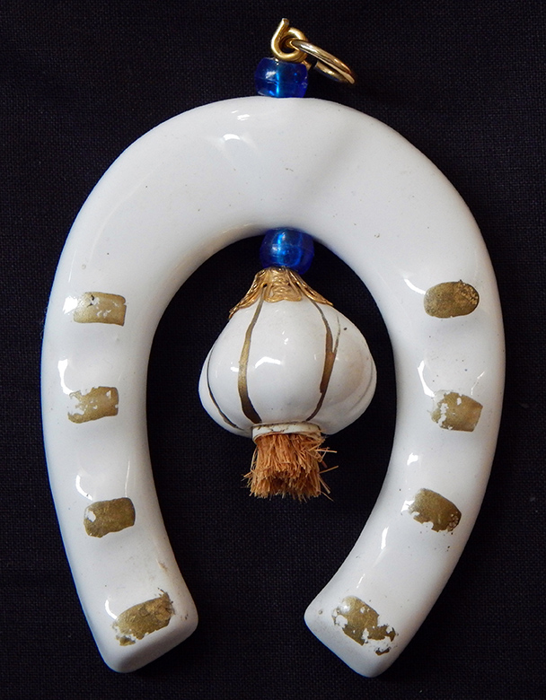 Horseshoe and garlic amulet