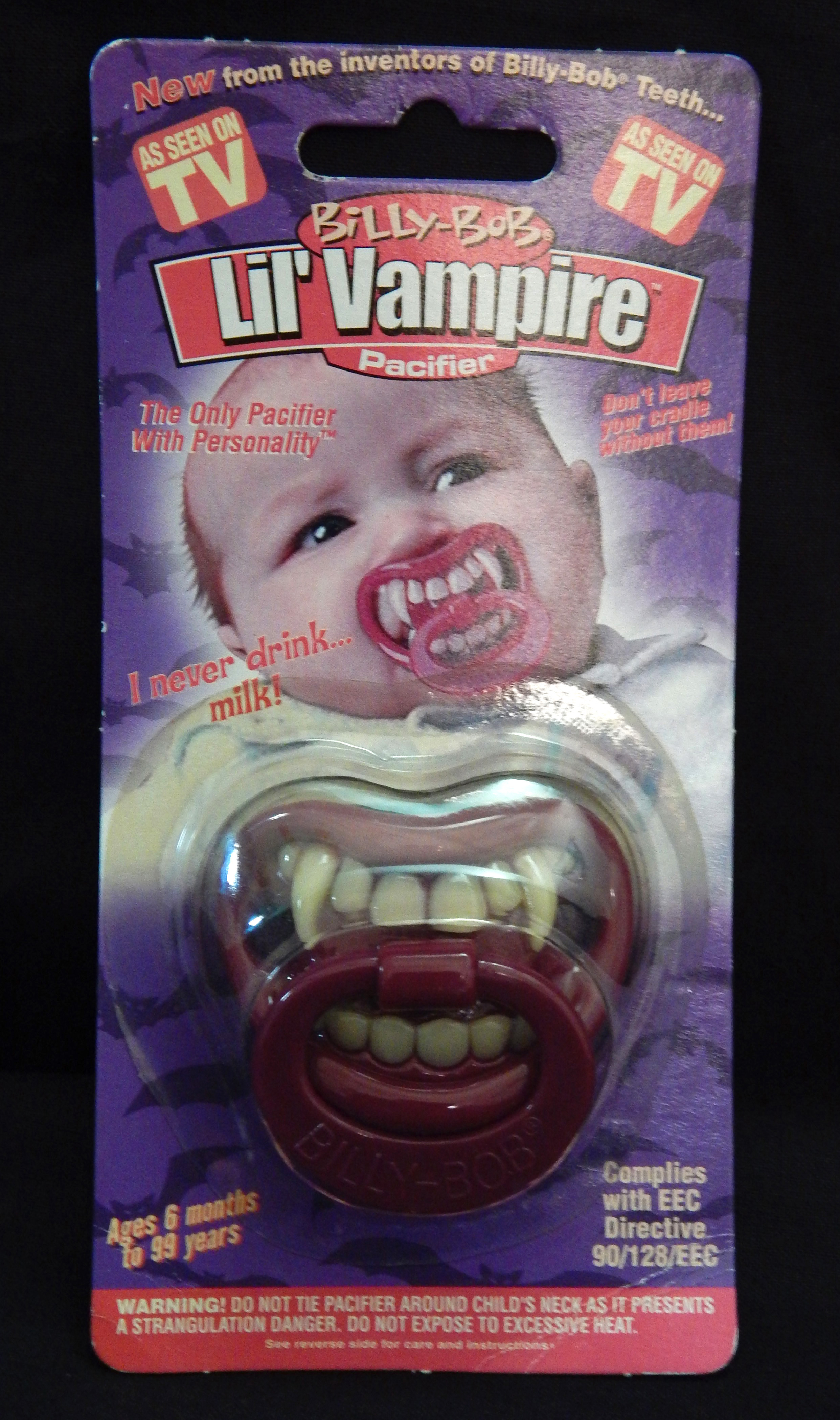 Baby pacifier with fangs