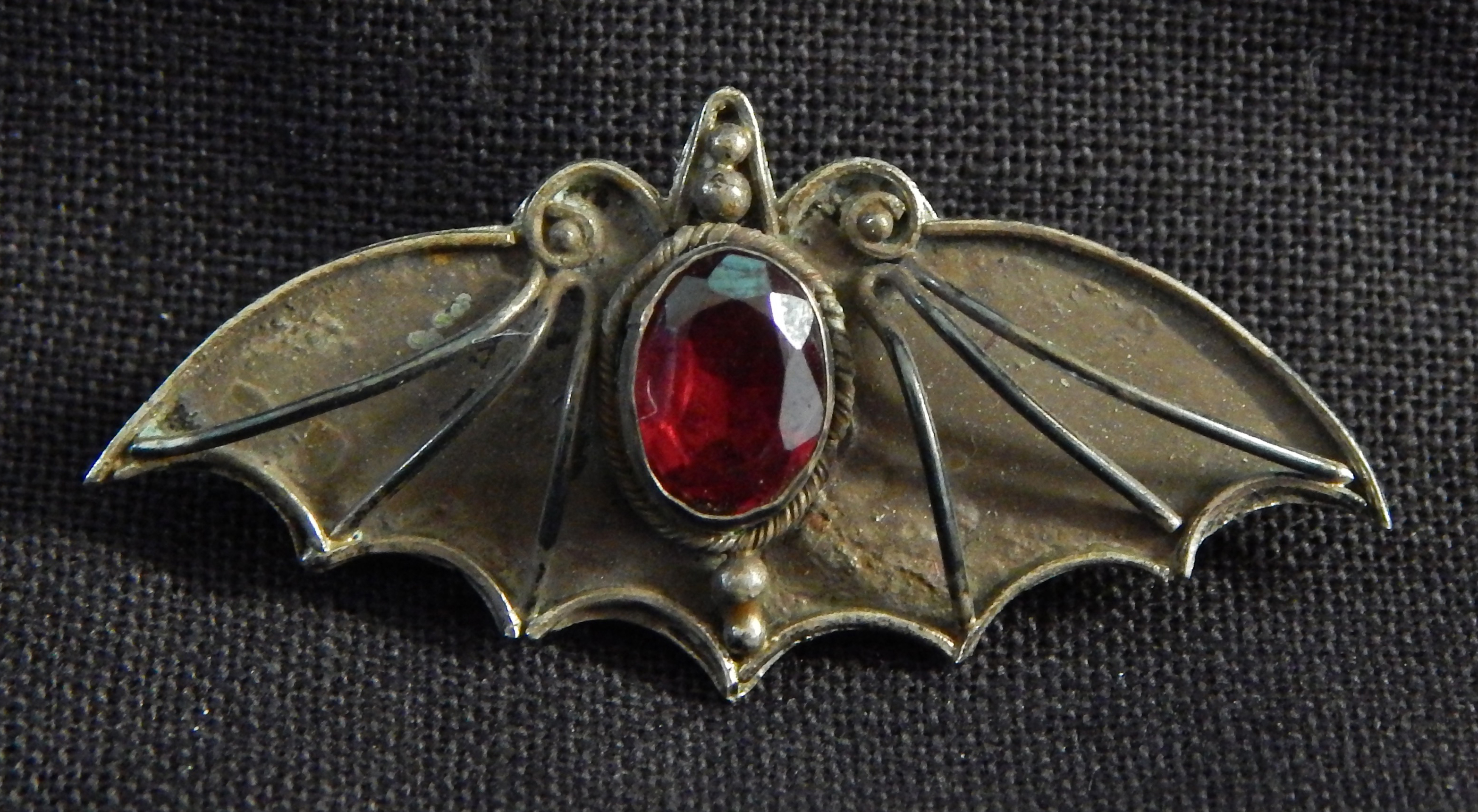 Bat pin with gemstone