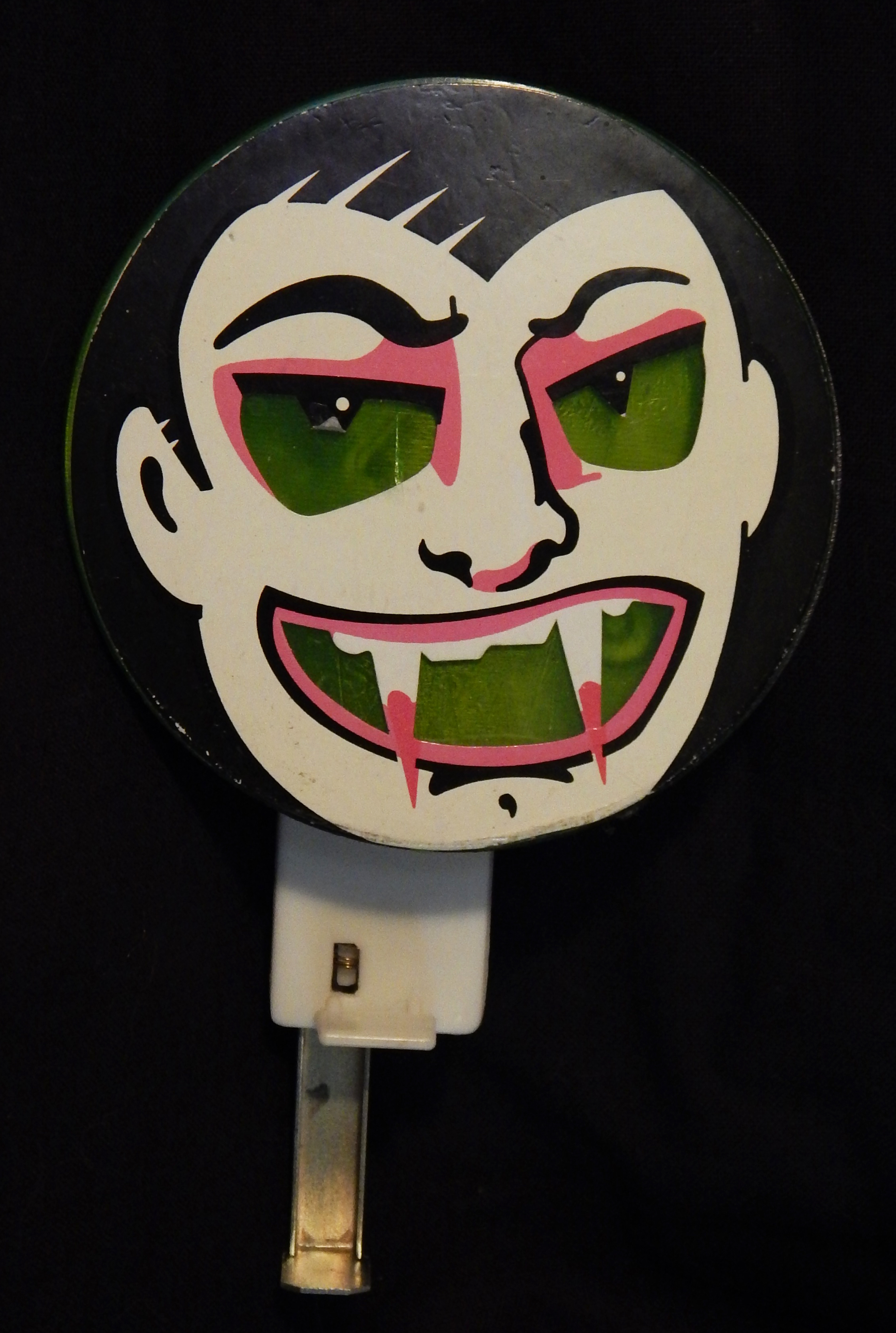 Noisemaker with image of vampire