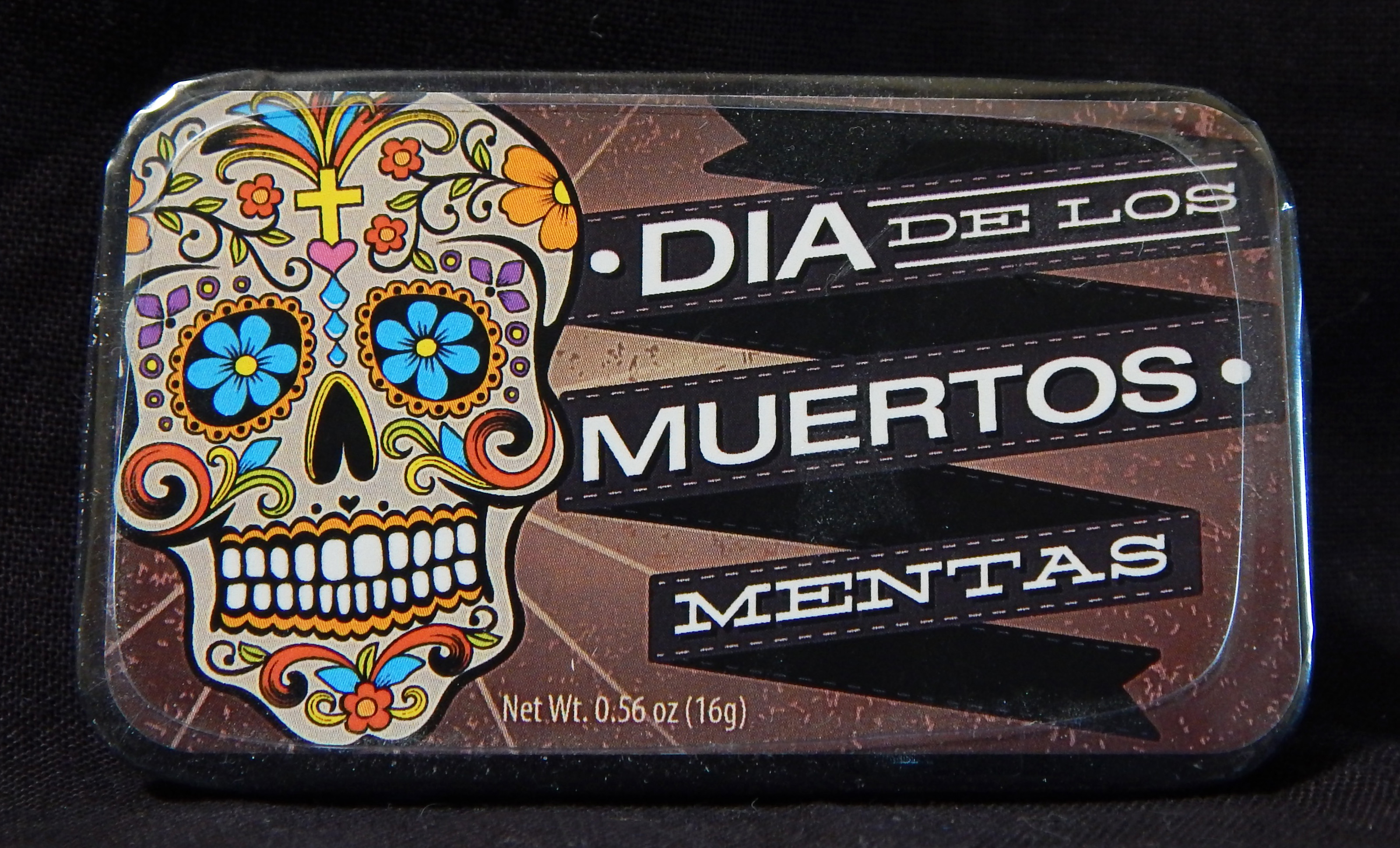 Box of mints with decorated skull