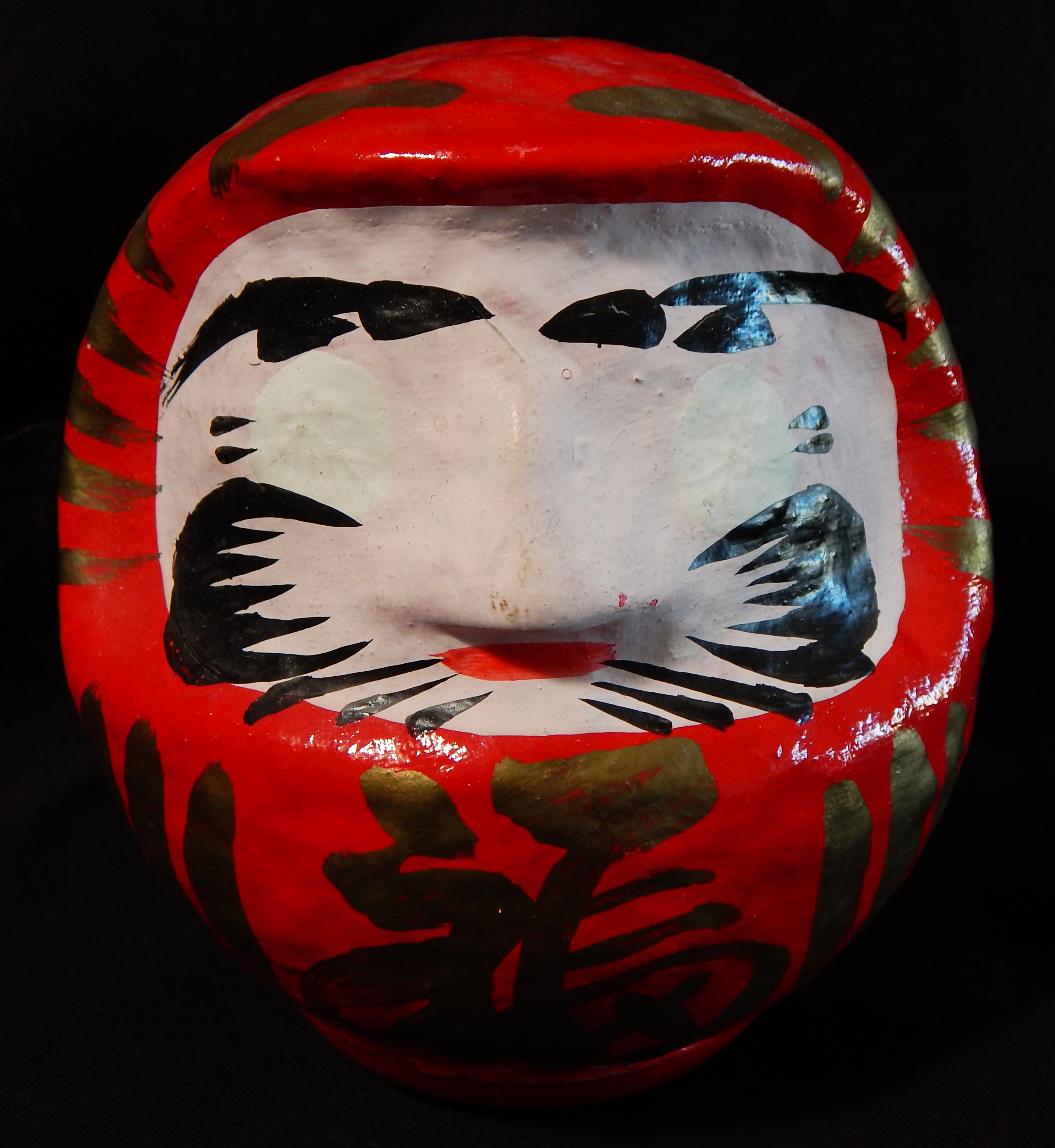 Daruma doll with rounded bottom