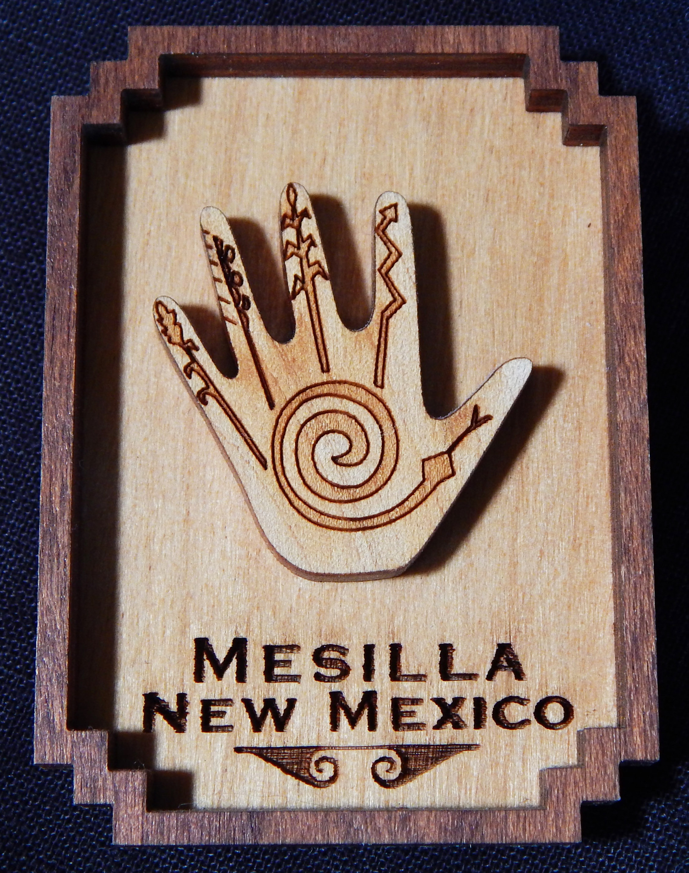 Framed hand with design