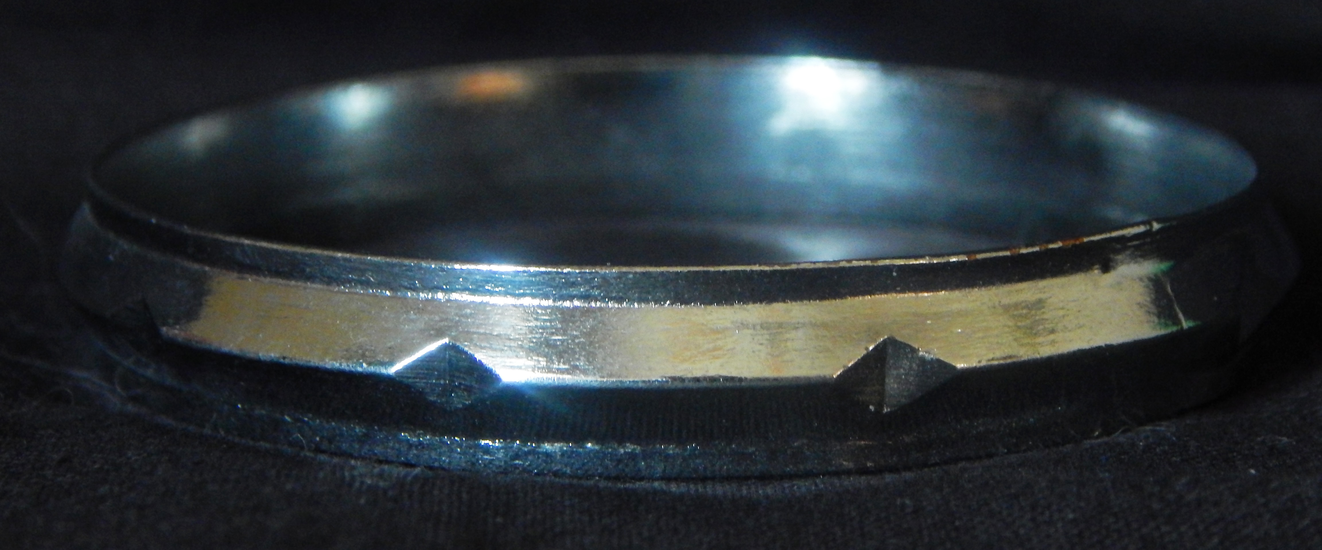 Worn on right arm. One of the five Ks of Sikhism