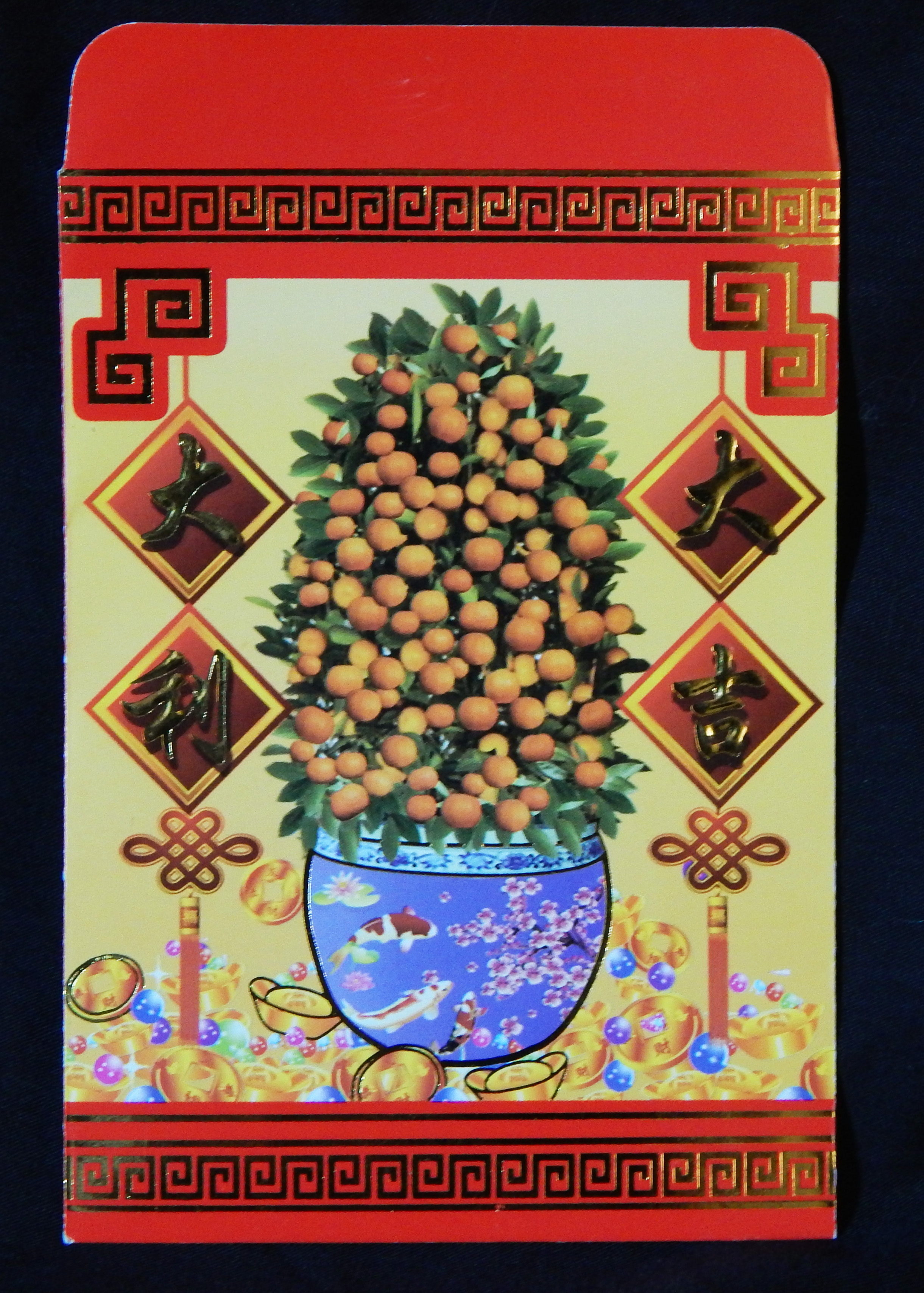 Gift money placed inside for rites of passage and holiday celebrations.