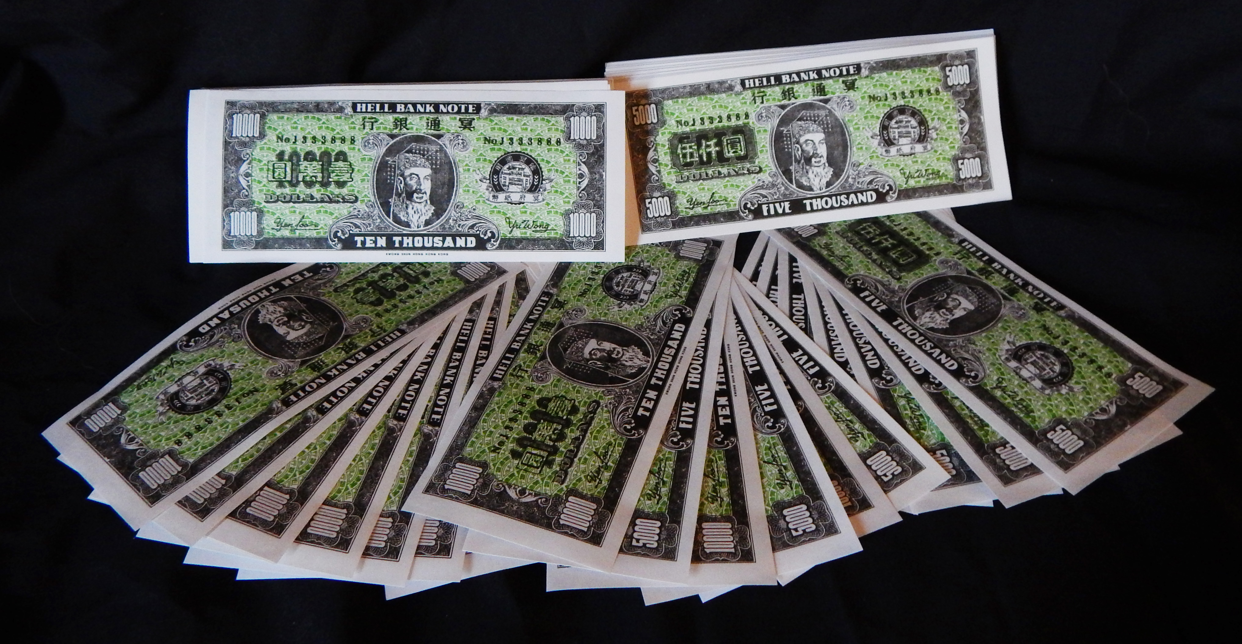 Burned at funerals for use in the next life-China/Vietnam/United States-Buddhist-Paper/ink-6 1/4" x 2 1/2"