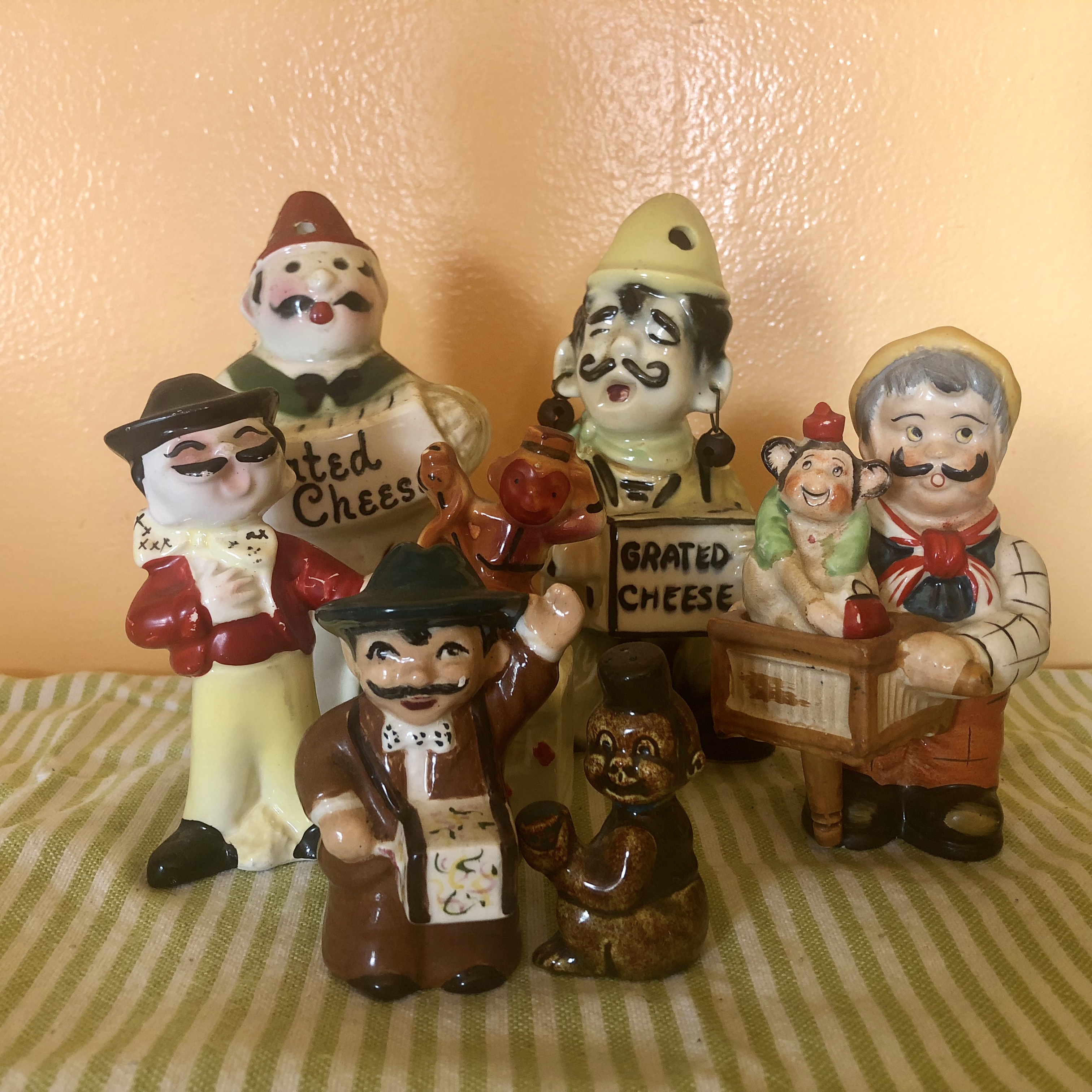 Miscellaneous Cheese and Salt & Pepper Shakers, 1950s, ceramic, cork stoppers, metal, paint Varying dimensions from 6” (tallest) to 3¼” (shortest), not including monkeys