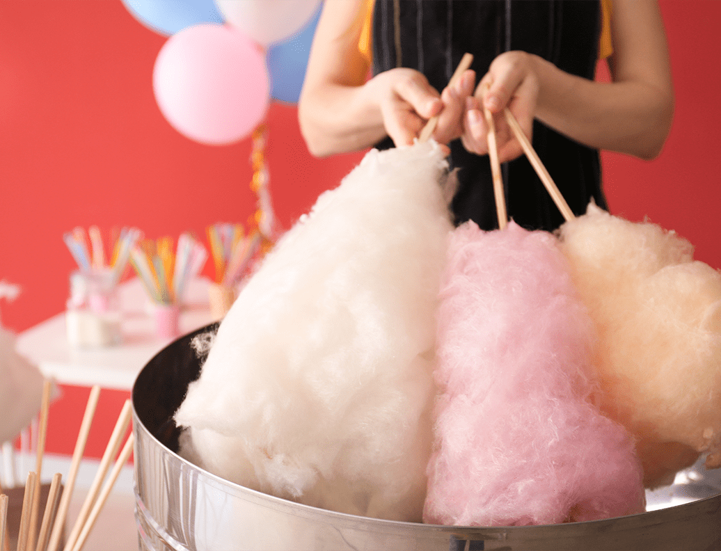 Woman Making Cotton Candy At Fair
